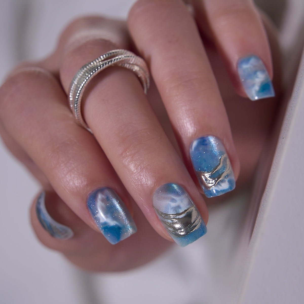 Ocean Wings – S Squoval nail size guide