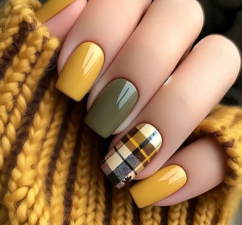 Autumn Plaid short squoval press-on nails worn on a hand