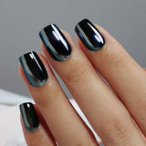 Black Mirror short squoval press-on nails worn on a hand