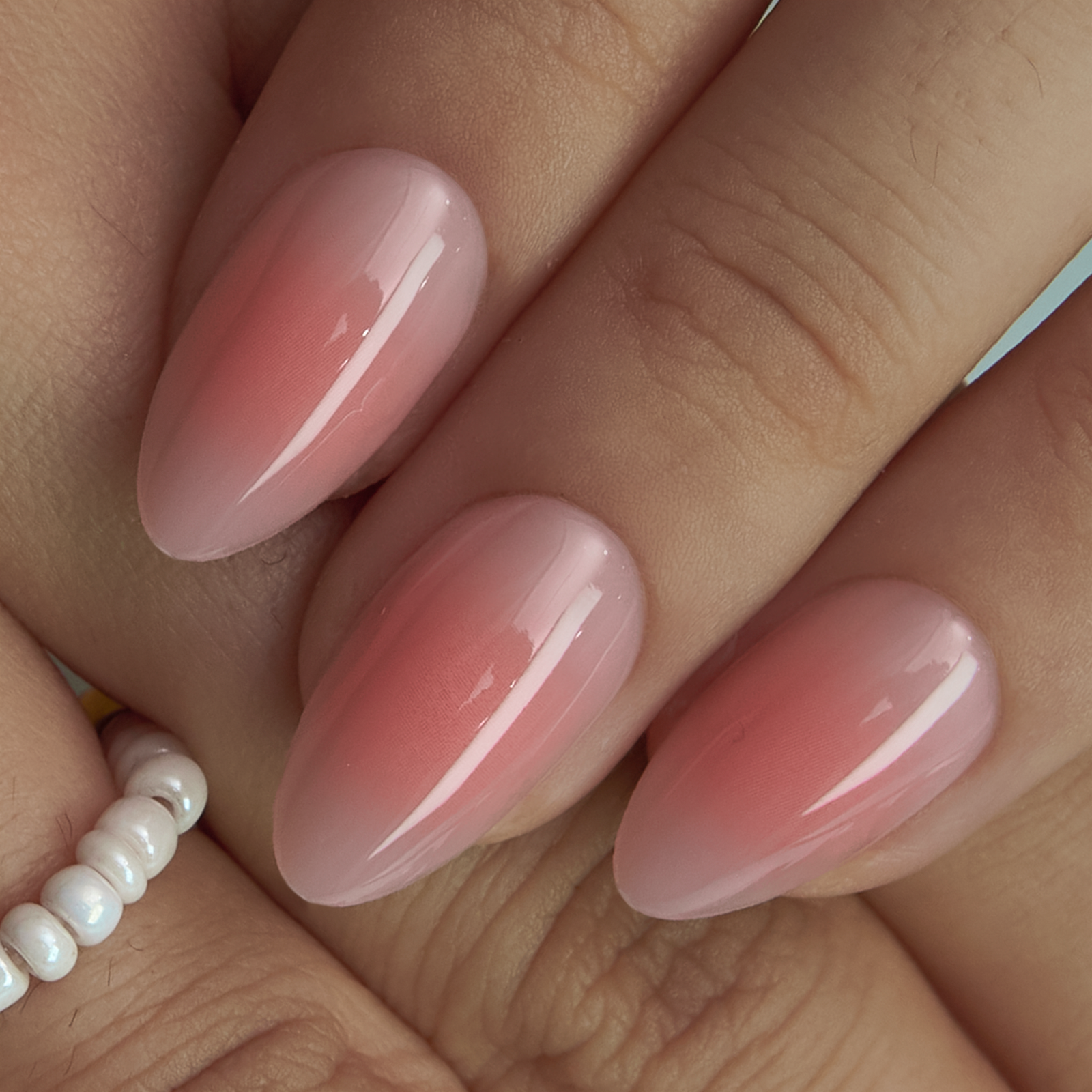 Blossom Veil short almond press-on nails from the side
