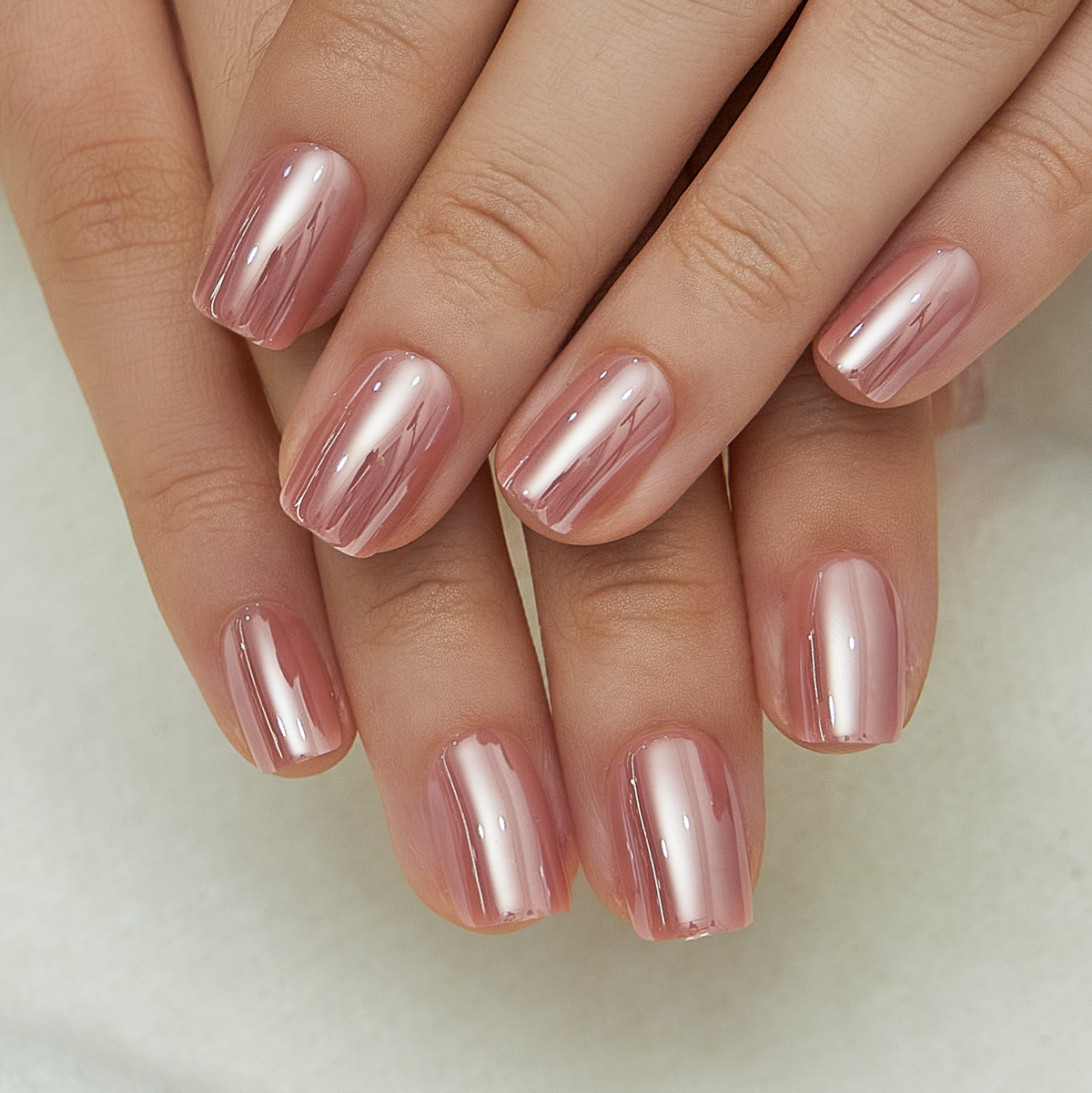 Blush Glossy short squoval press-on nails from the side