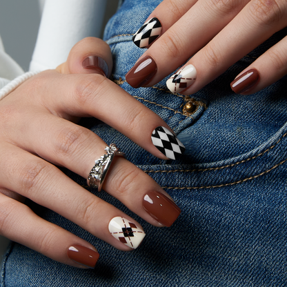 Blush Leopard short squoval press-on nails worn on a hand