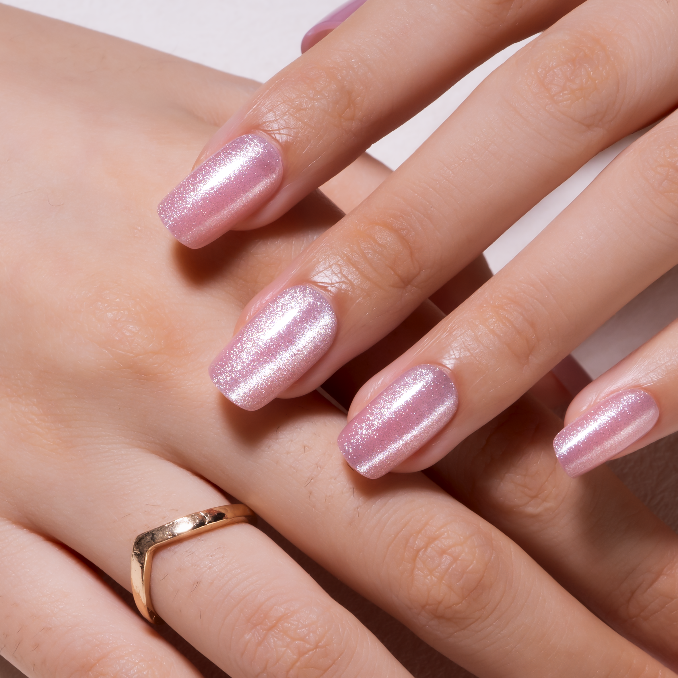 Blush Whisper medium squoval press-on nails from the side