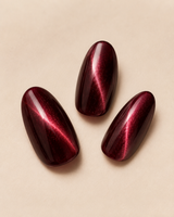 Burgundy Velvet medium almond press-on nails from the side