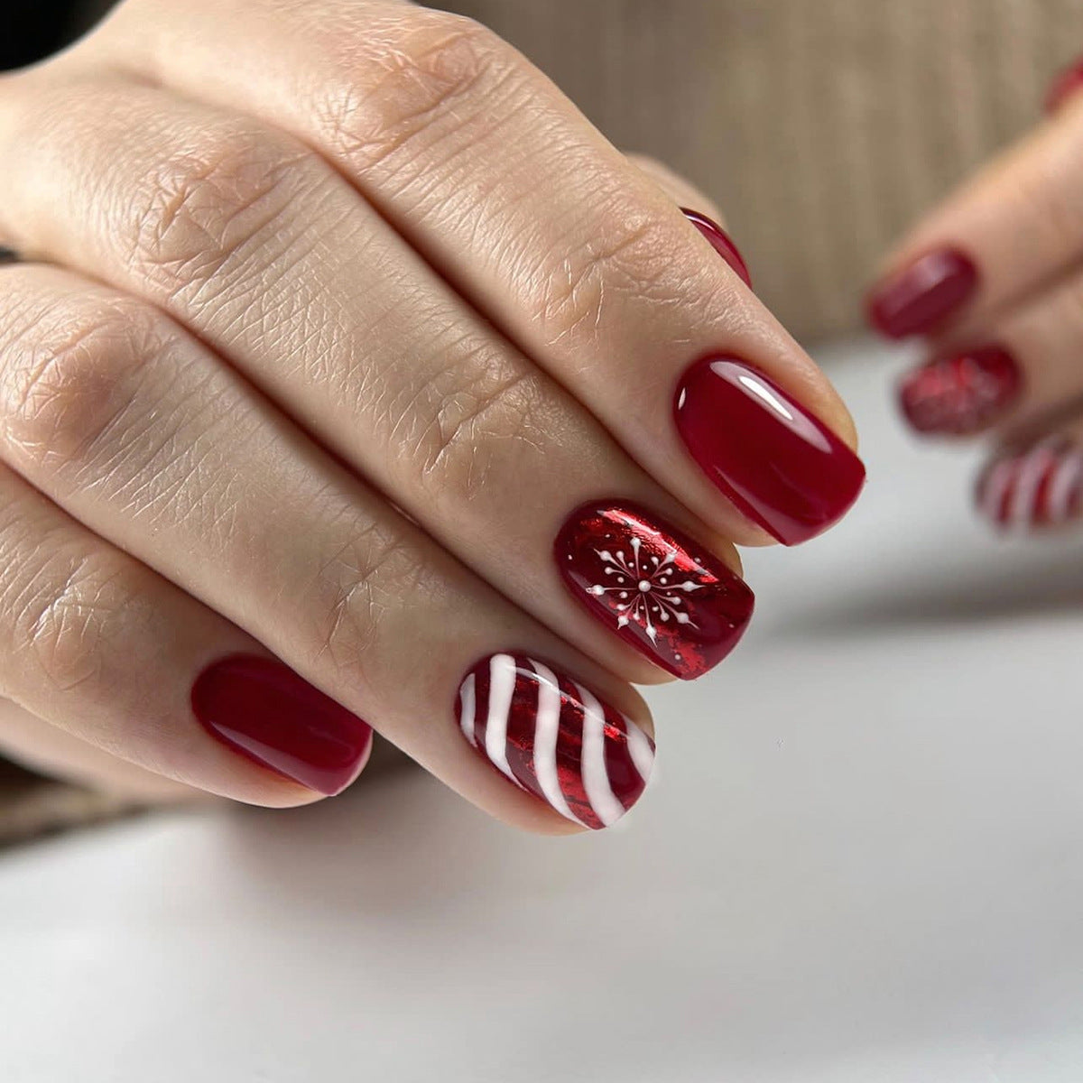 Candy Snow short squoval press-on nails from the side
