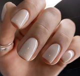Chic Mickey Gray short squoval Style 2 press-on nails worn on a hand