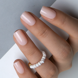 Classic Nude short squoval press-on nails from the side