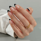 Classic Polka short almond press-on nails from the side