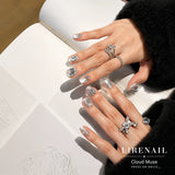Lirenail Cloud Muse crystal press-on nails worn on a hand