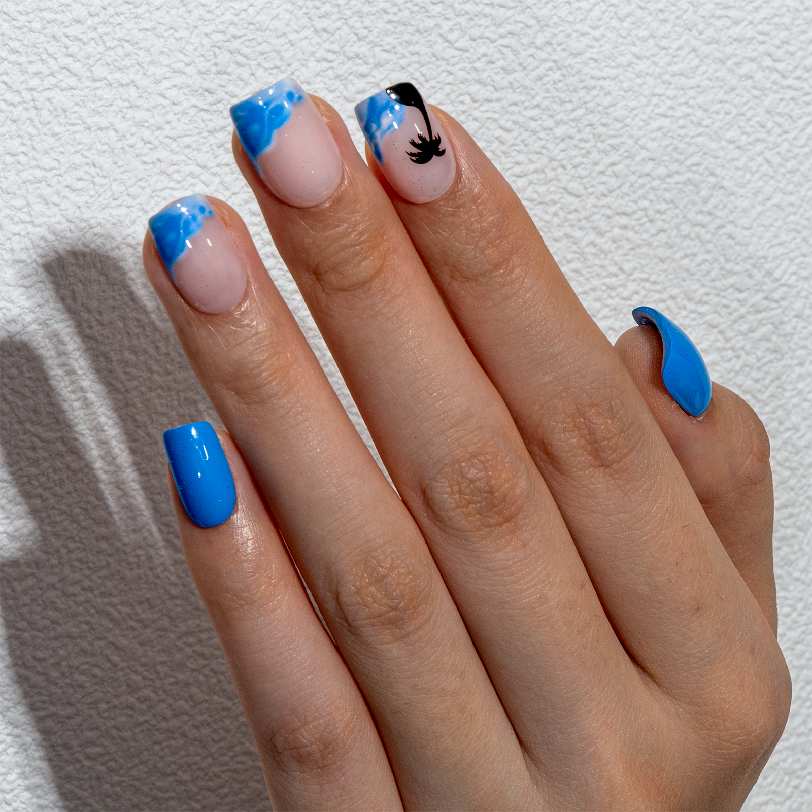 Coconut Palm short squoval press-on nails from the side