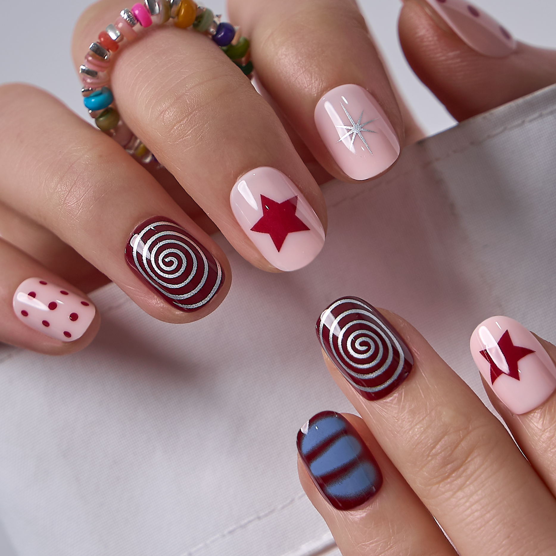Crimson Swirl Rs squoval press-on nails