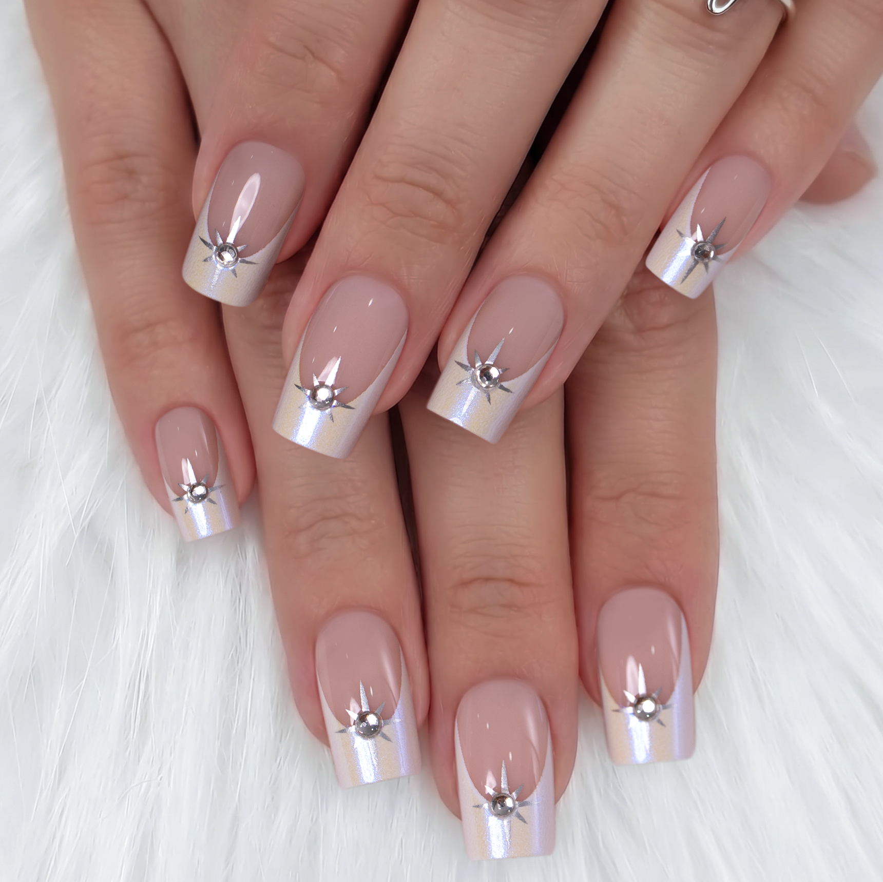 Crystal Halo medium square press-on nails worn on a hand
