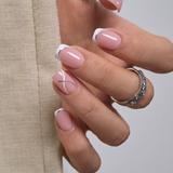 Crystal Whisper short squoval press-on nails from the side