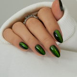 Dark Forest short almond press-on nails from the side