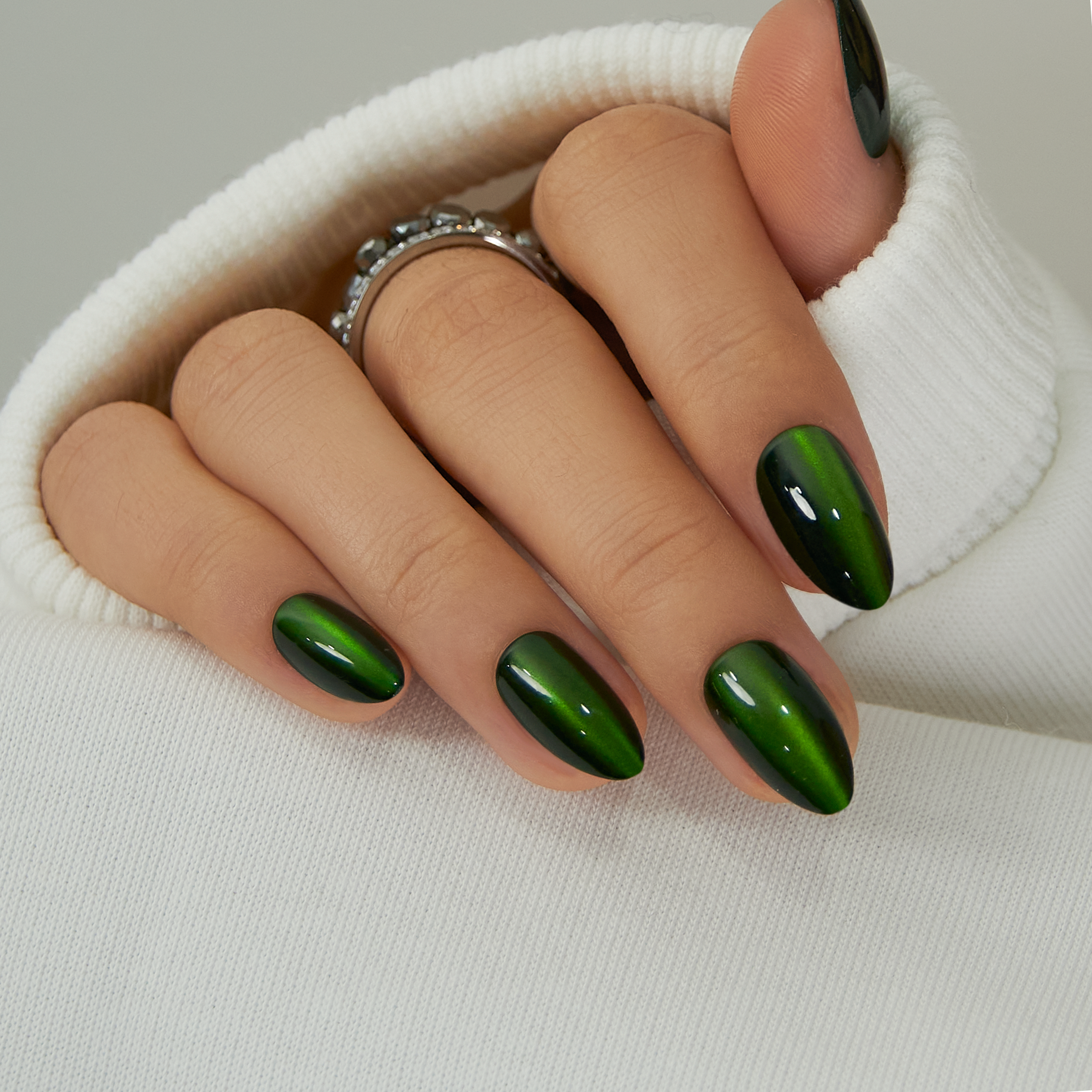 Dark Forest short almond press-on nails from the side