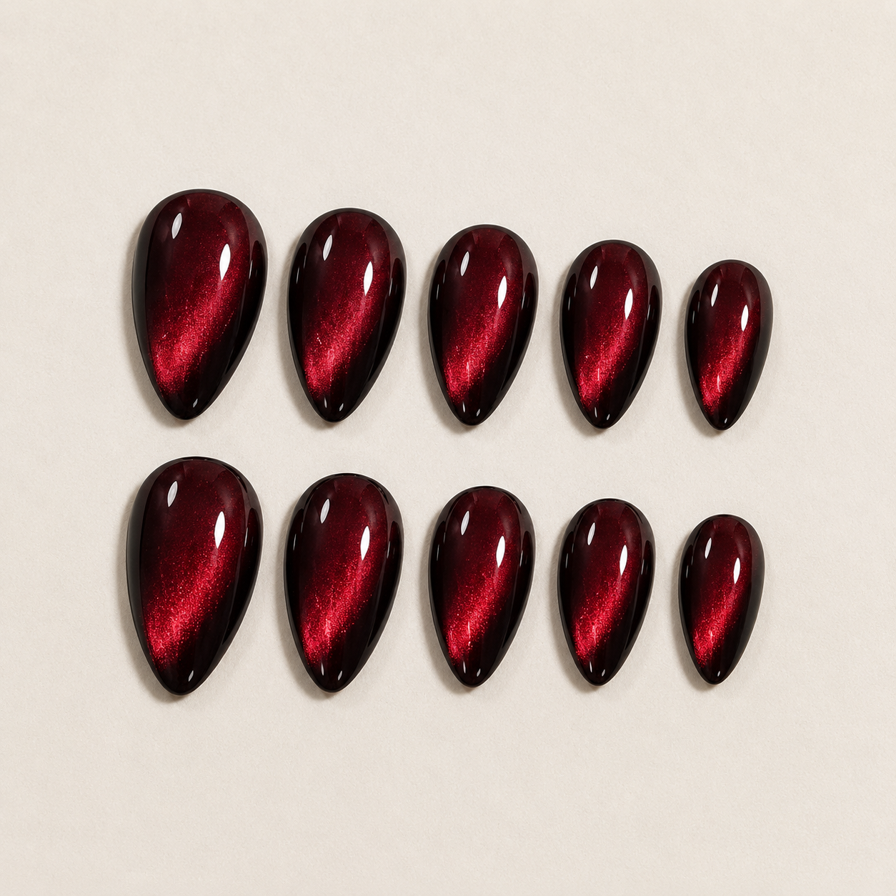 Red Almond Long press-on nails by Lirenail - detail view