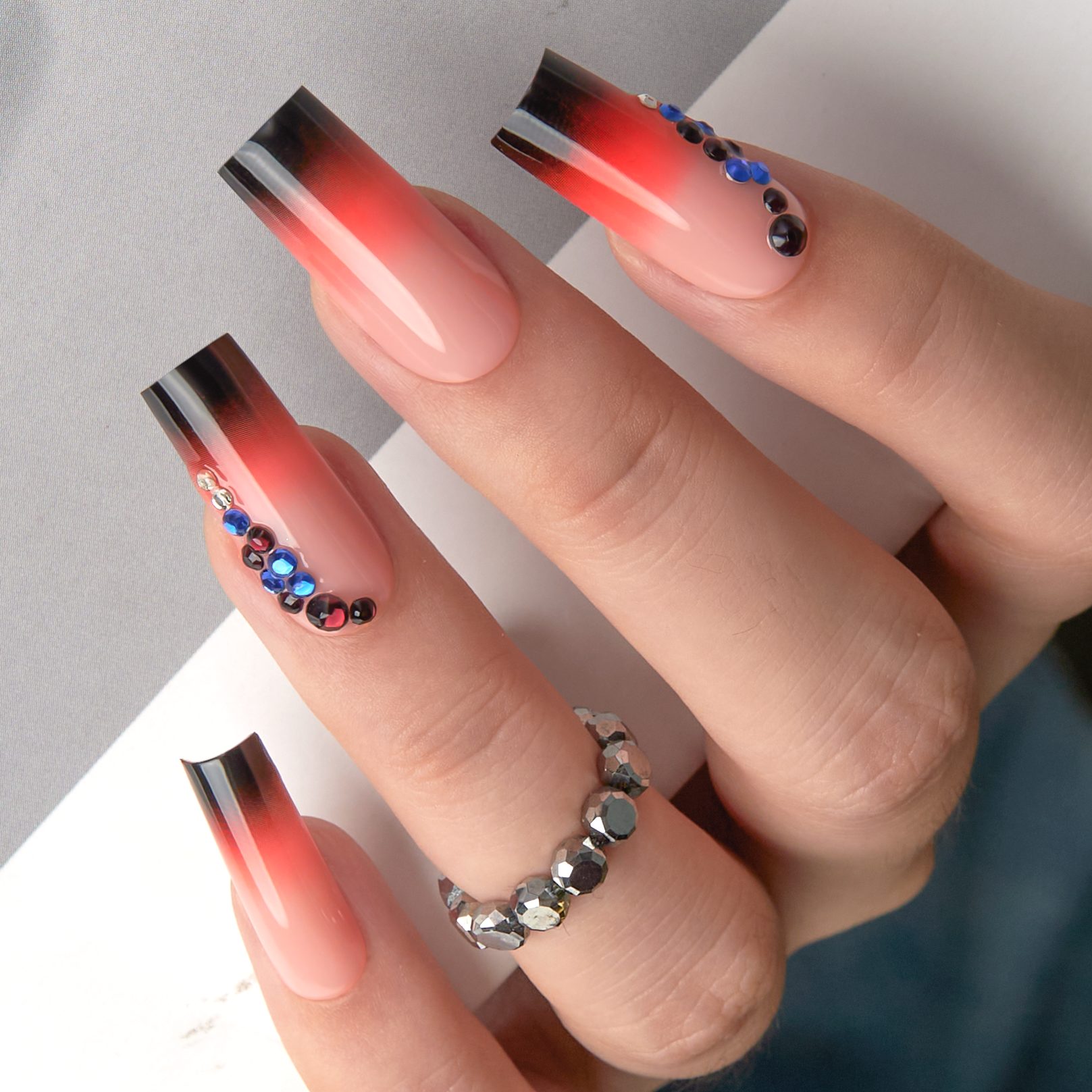 Designer S Pick Crimson Diamond long square press-on nails from the side