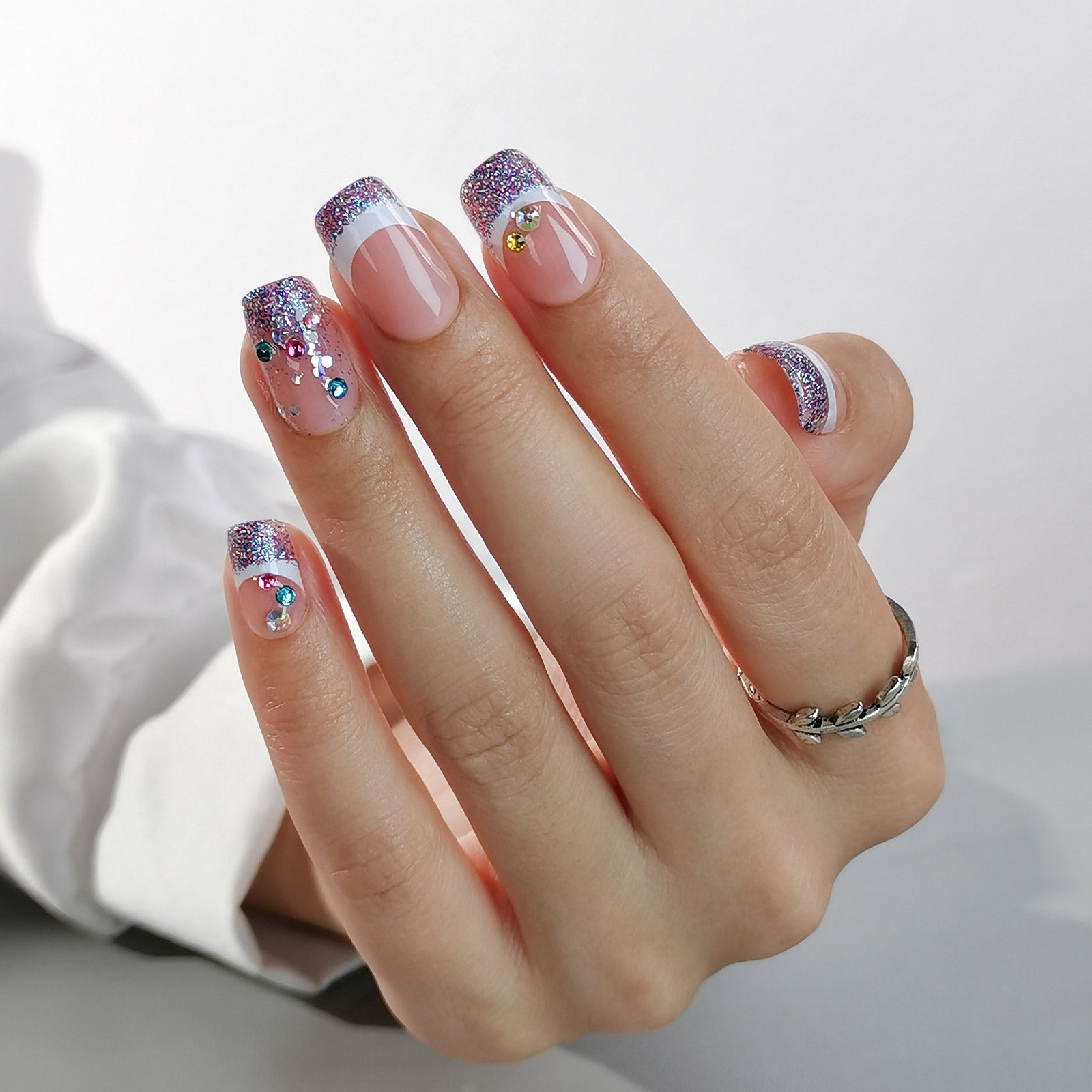 Designer S Pick Glitter Crown medium squoval nail detail