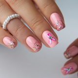 Designer S Pick Weet Bow Sparkle medium squoval nail detail