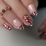 Dotty Delight short almond nail detail