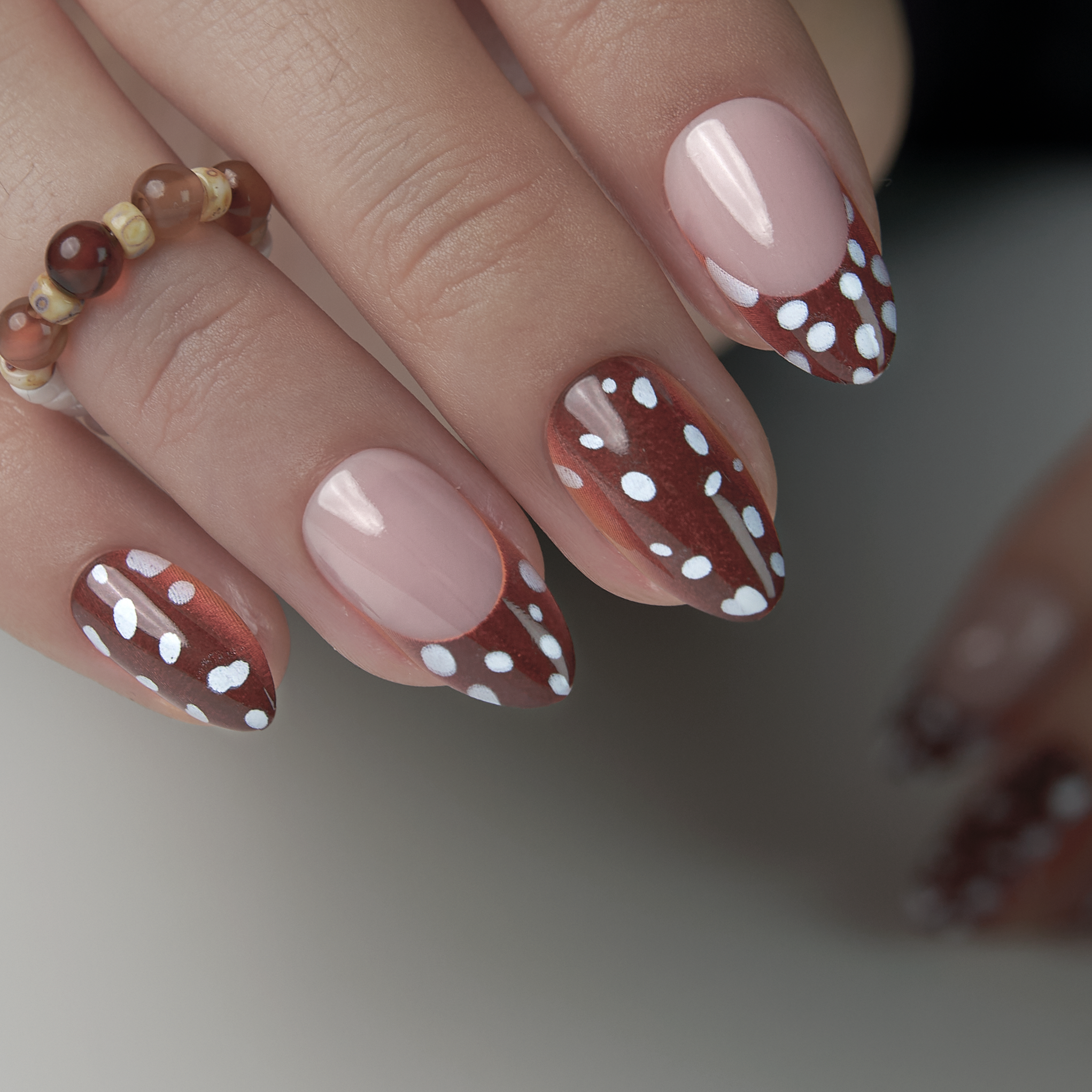 Dotty Delight short almond nail detail