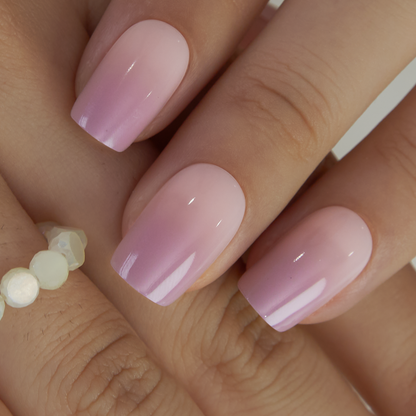 Elegant Fade medium squoval press-on nails from the side