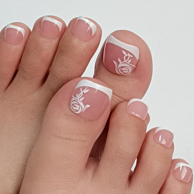 French Rose squoval Toenails press-on nails worn on a hand