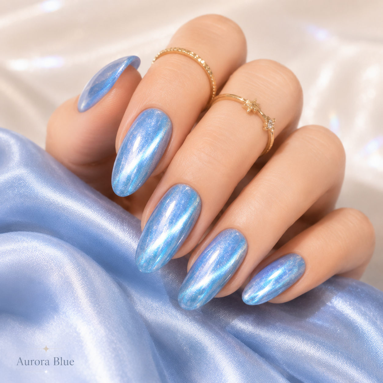 Galaxy Aurora Cat Eye press-on nail set worn on a hand