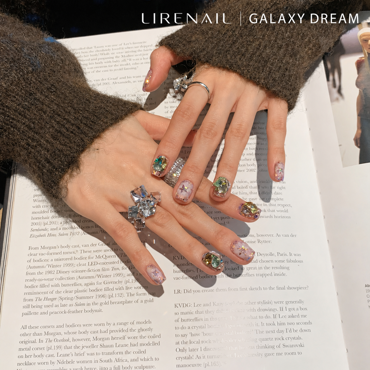 Galaxy Dream press-on nails styled with jewelry