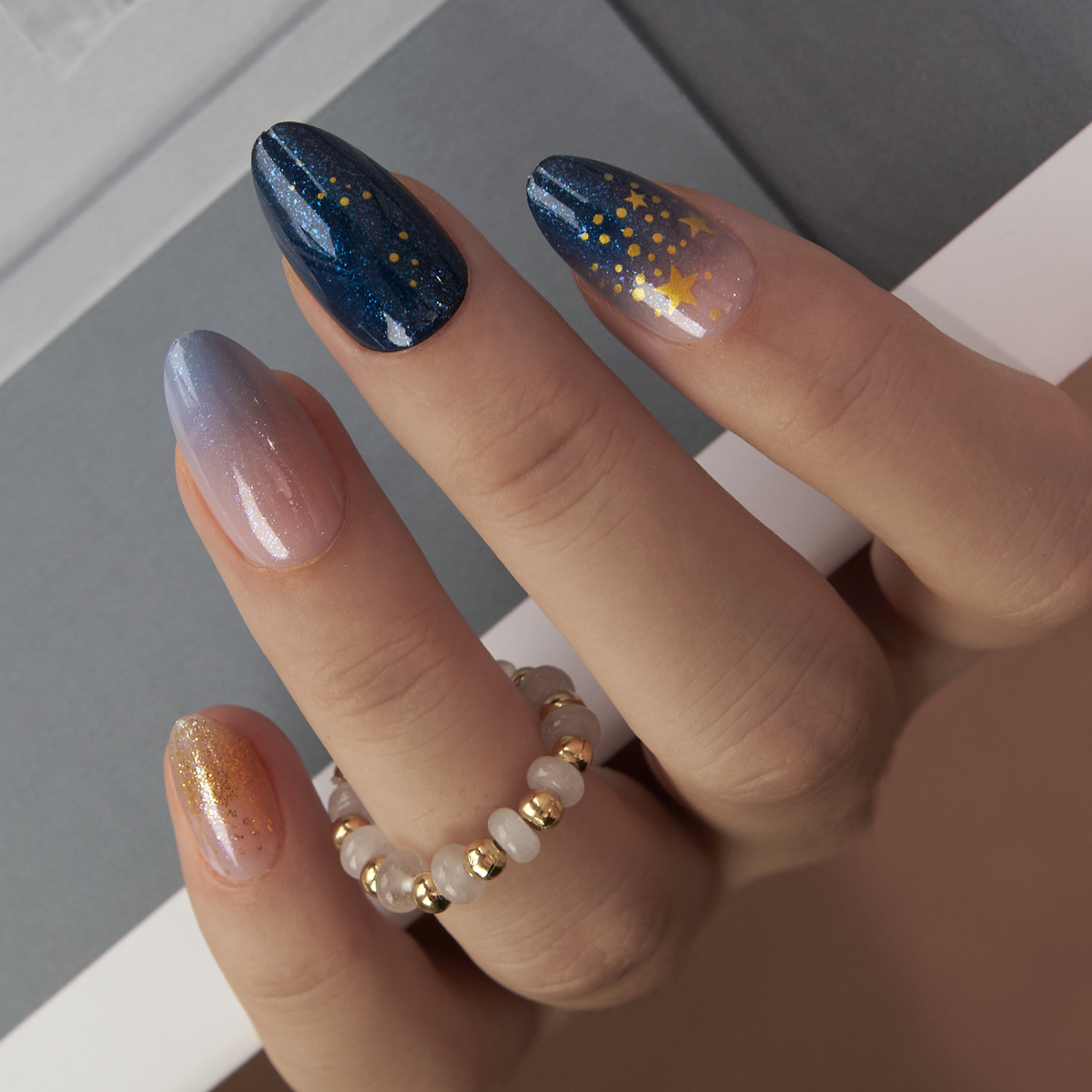 Galaxy Glow Muse short almond nail detail