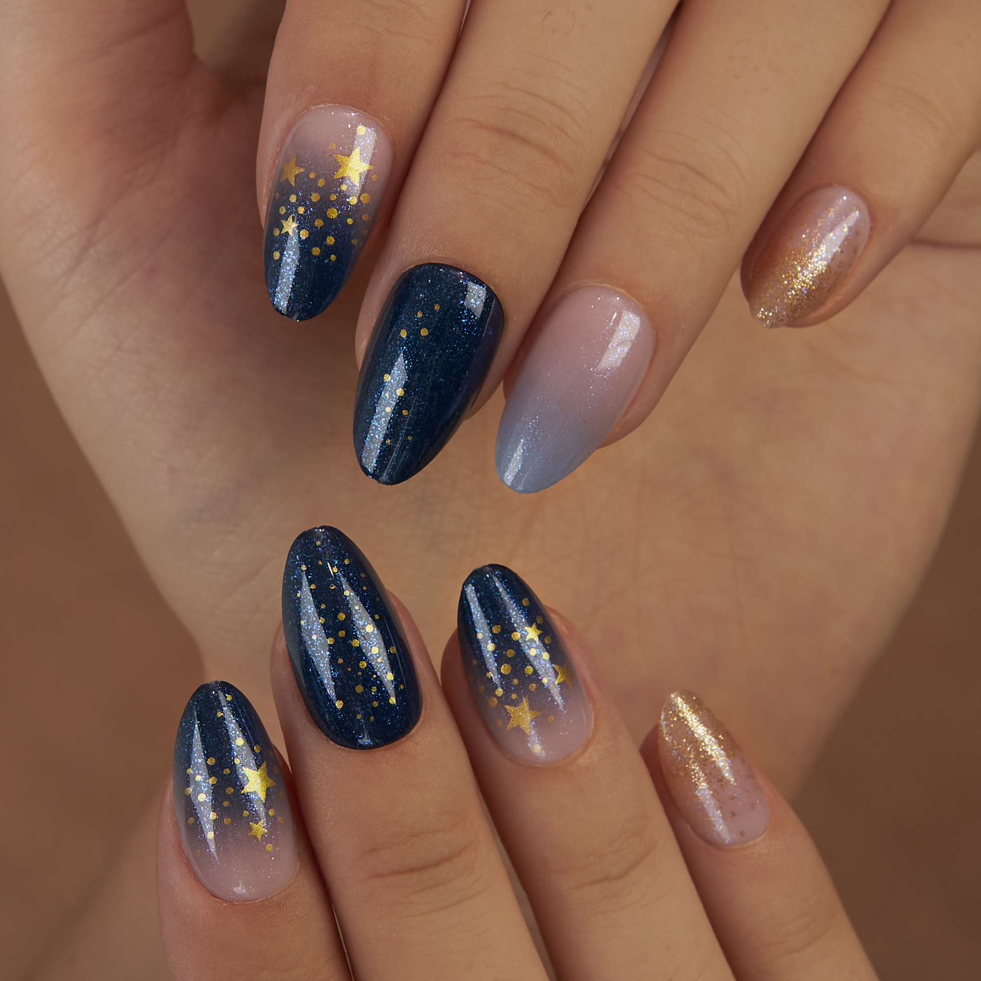 Galaxy Glow Muse short almond press-on nails from the side