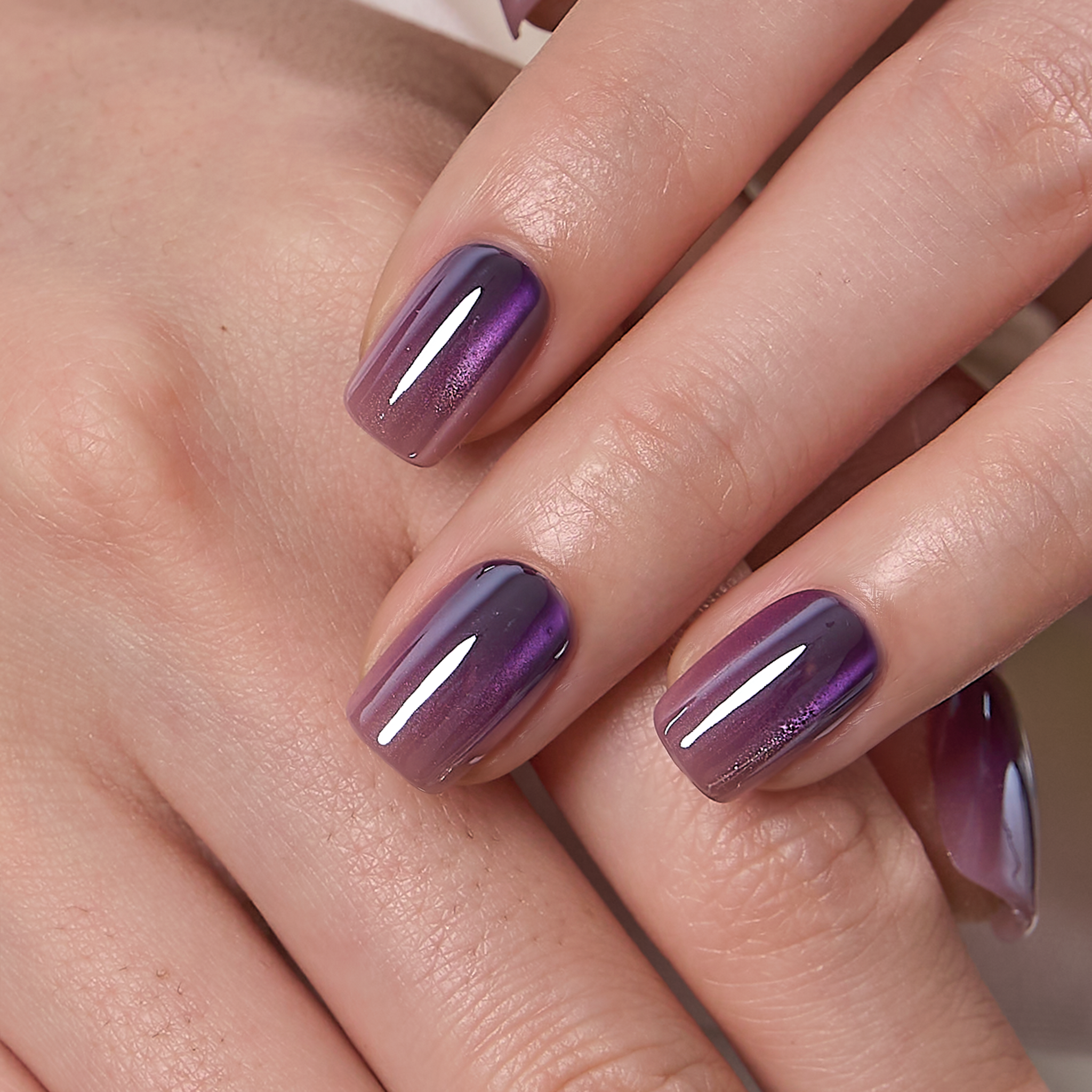 Galaxy Melt short squoval press-on nails from the side