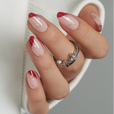 Glitter Star short almond press-on nails worn on a hand
