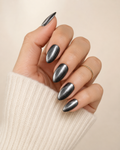 Gunmetal Glow medium almond press-on nails