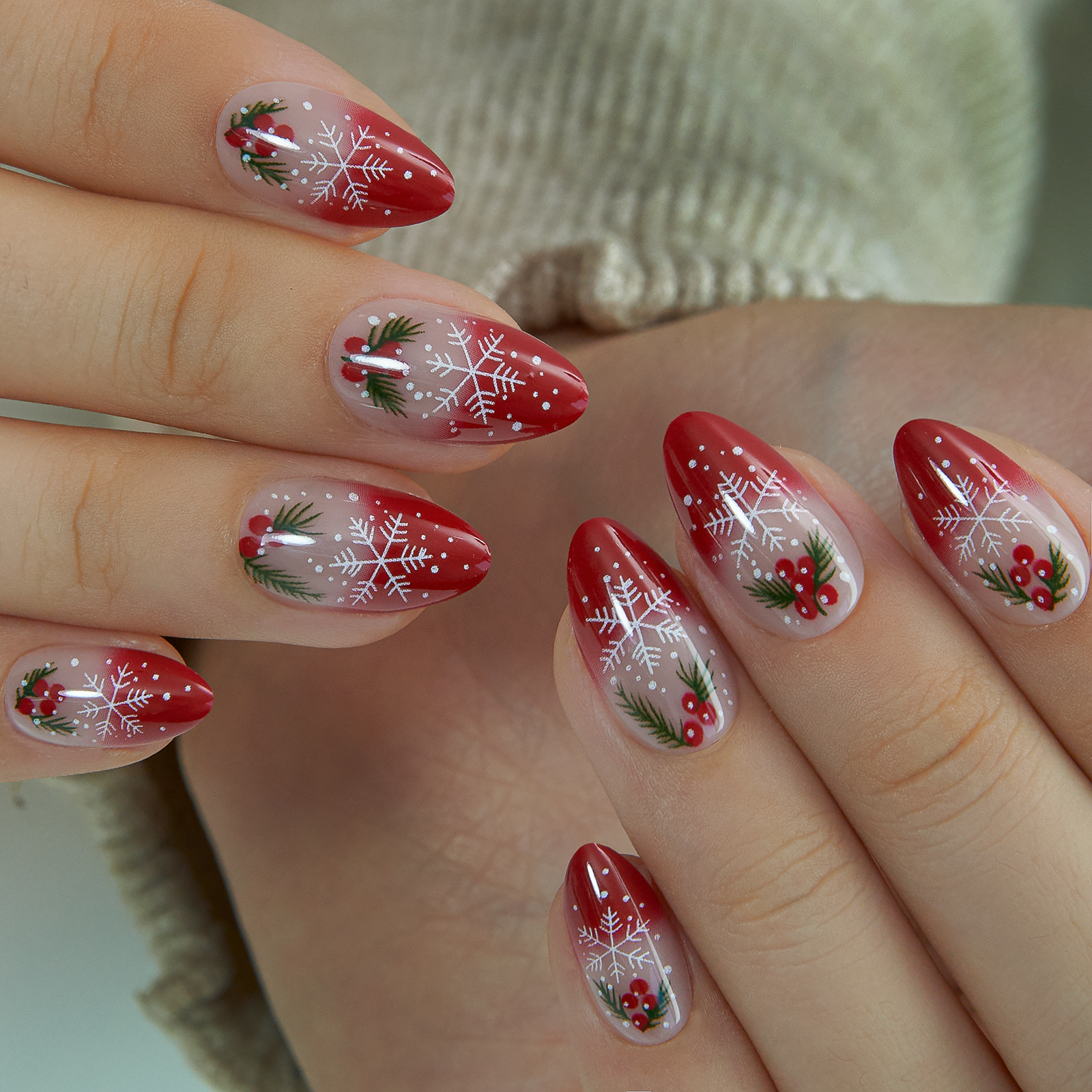 Holly Spark short almond press-on nails worn on a hand
