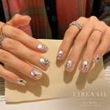Lirenail Ice Heart glitter press-on nails worn on a hand