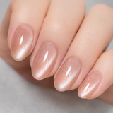 Light Nude Cat Eye short oval press-on nails from the side