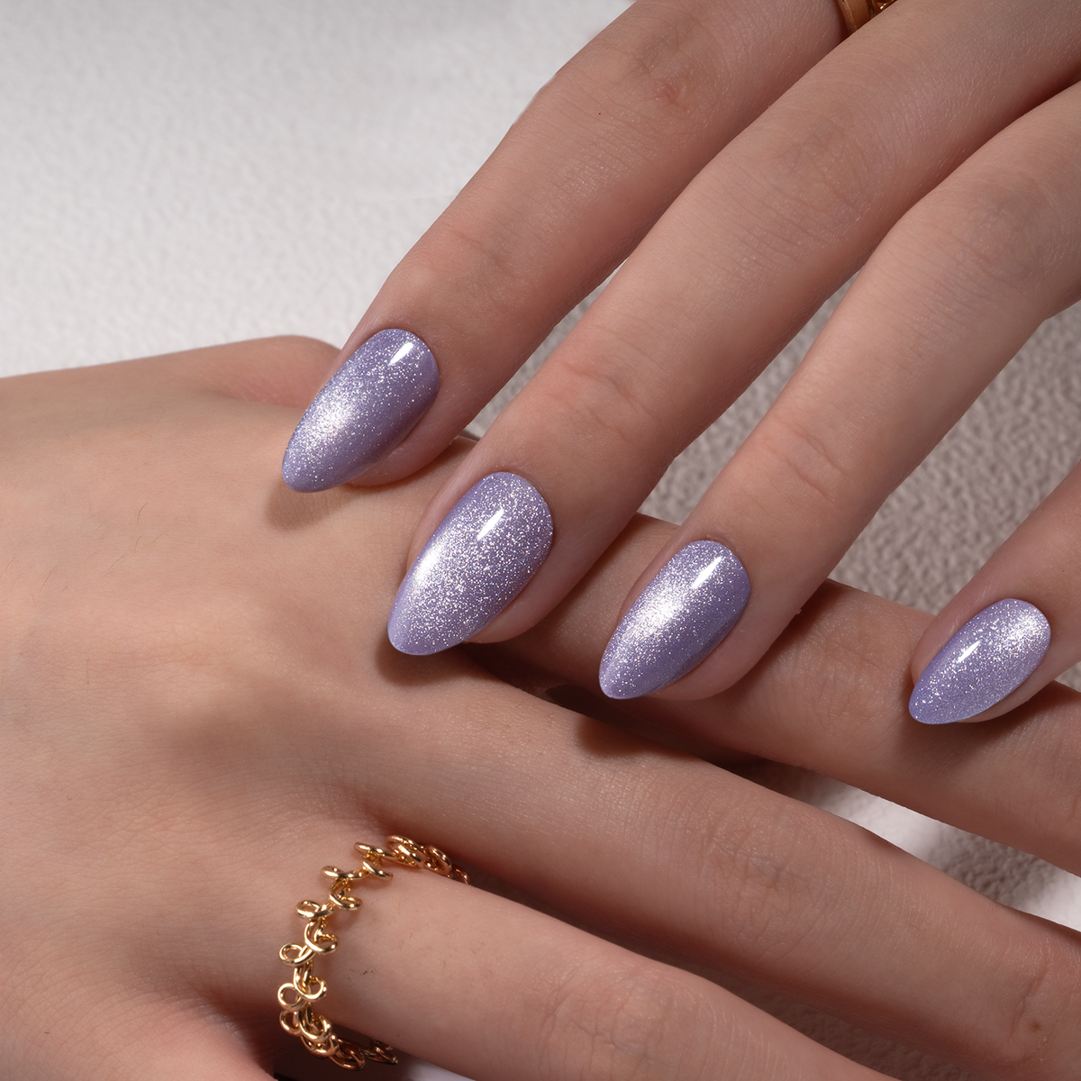 Lilac Shimmer short almond press-on nails from the side