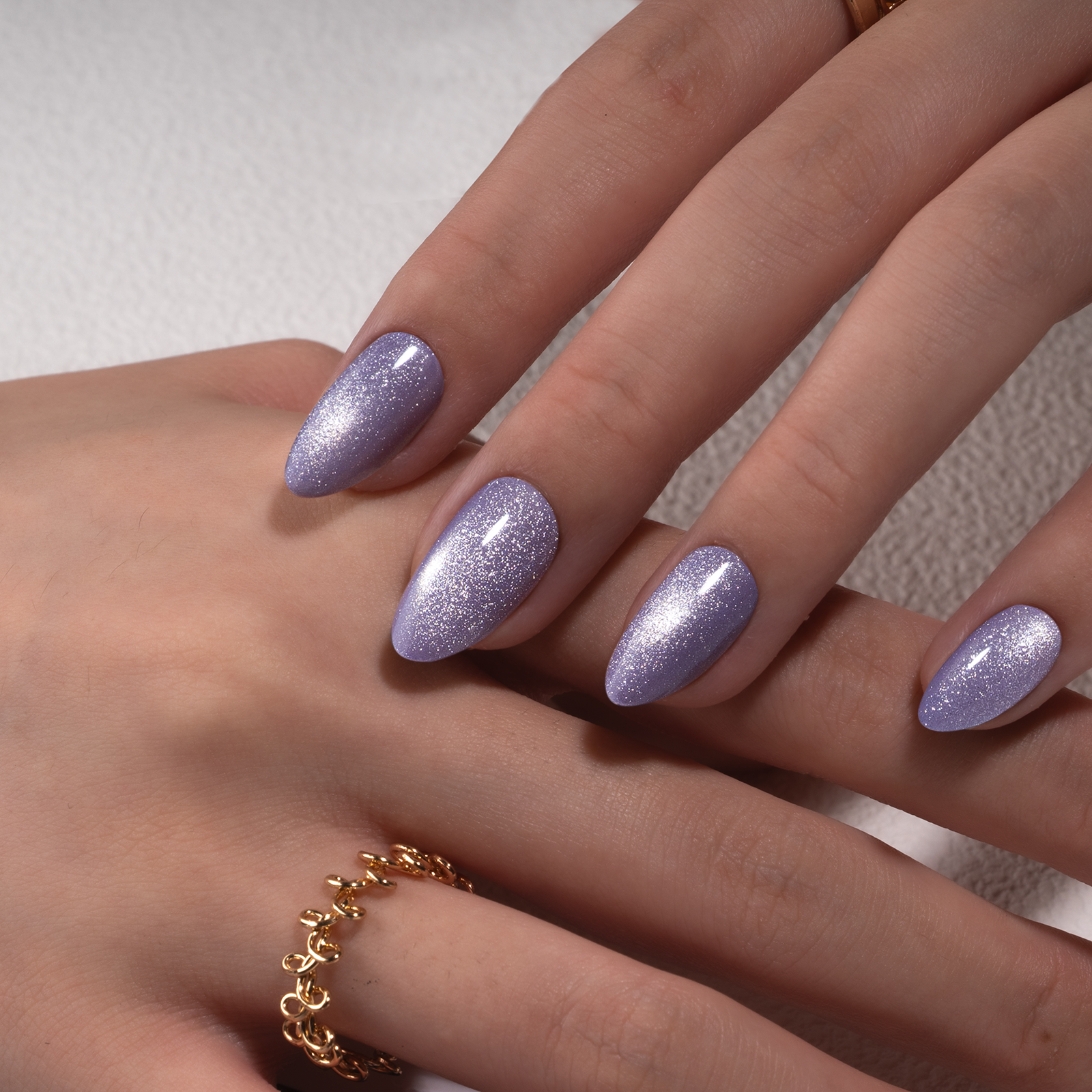 Lilac Shimmer short almond press-on nails from the side