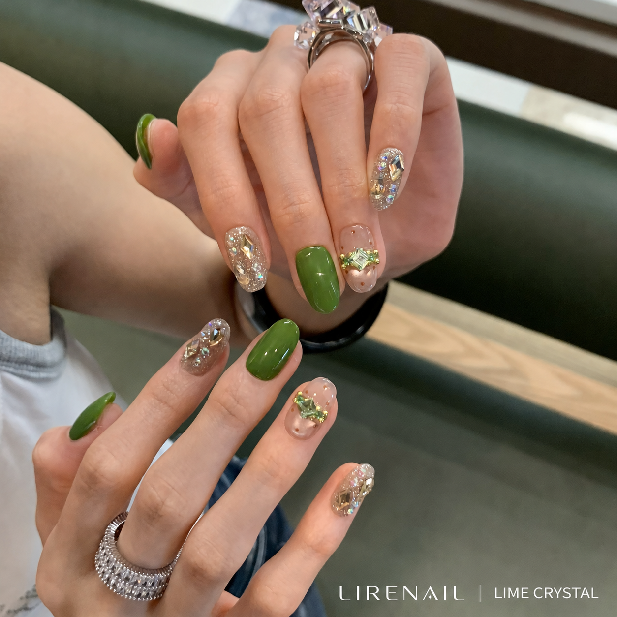 Lime Crystal press-on nails worn on both hands