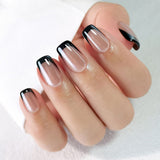 Midnight French medium squoval press-on nails worn on a hand