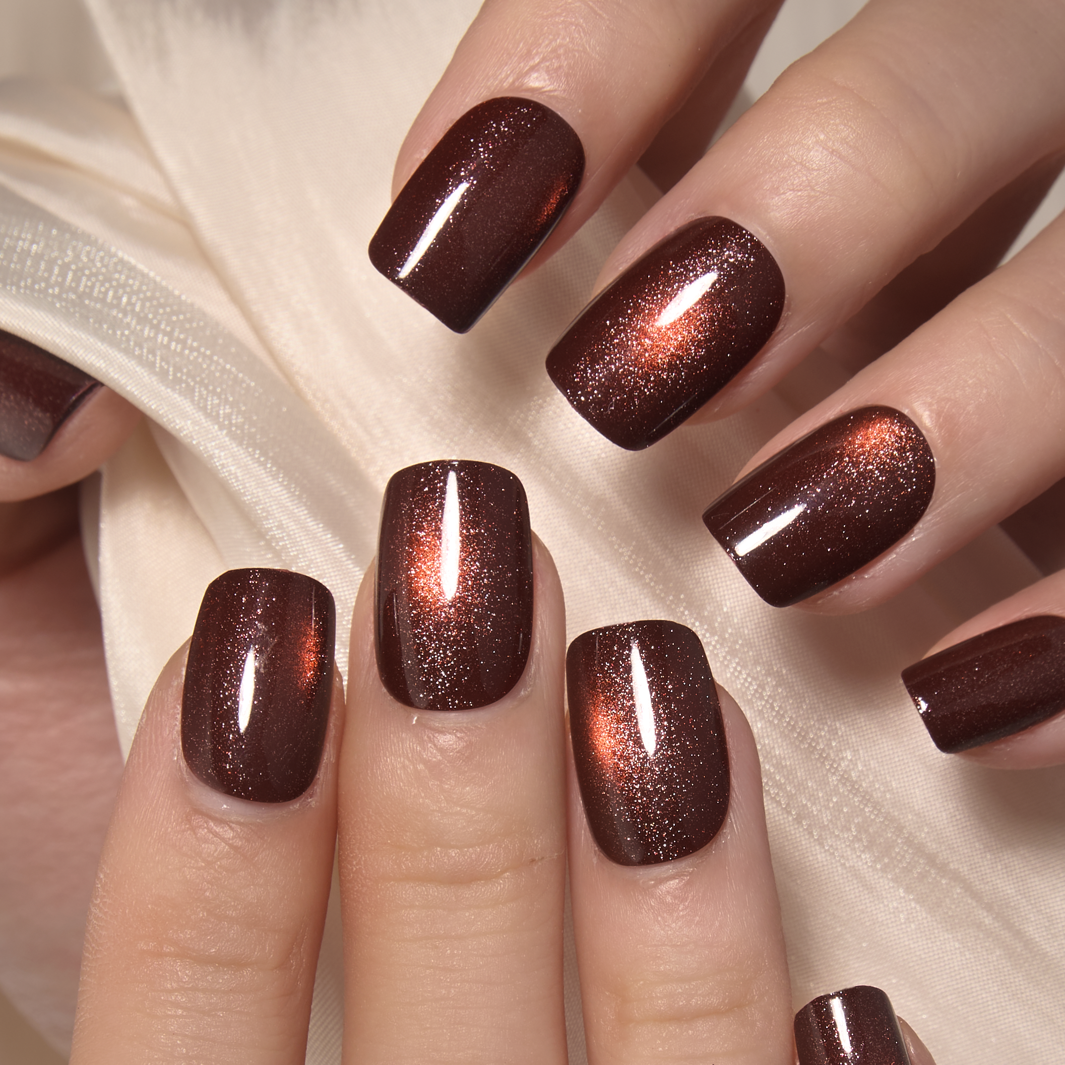 Midnight Spark short squoval press-on nails from the side
