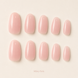 Milky Pink medium almond press-on nails from the side