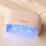 Mini Capsule UV LED nail lamp in use