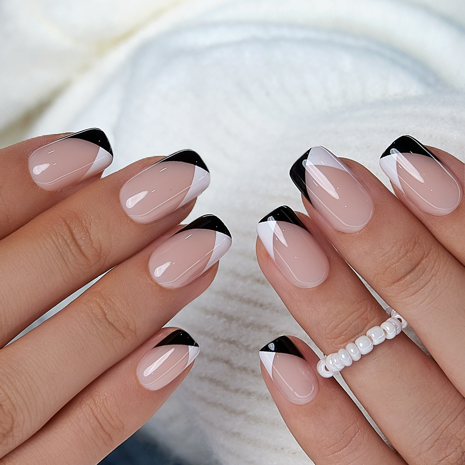 Minimal Contrast medium squoval press-on nails from the side