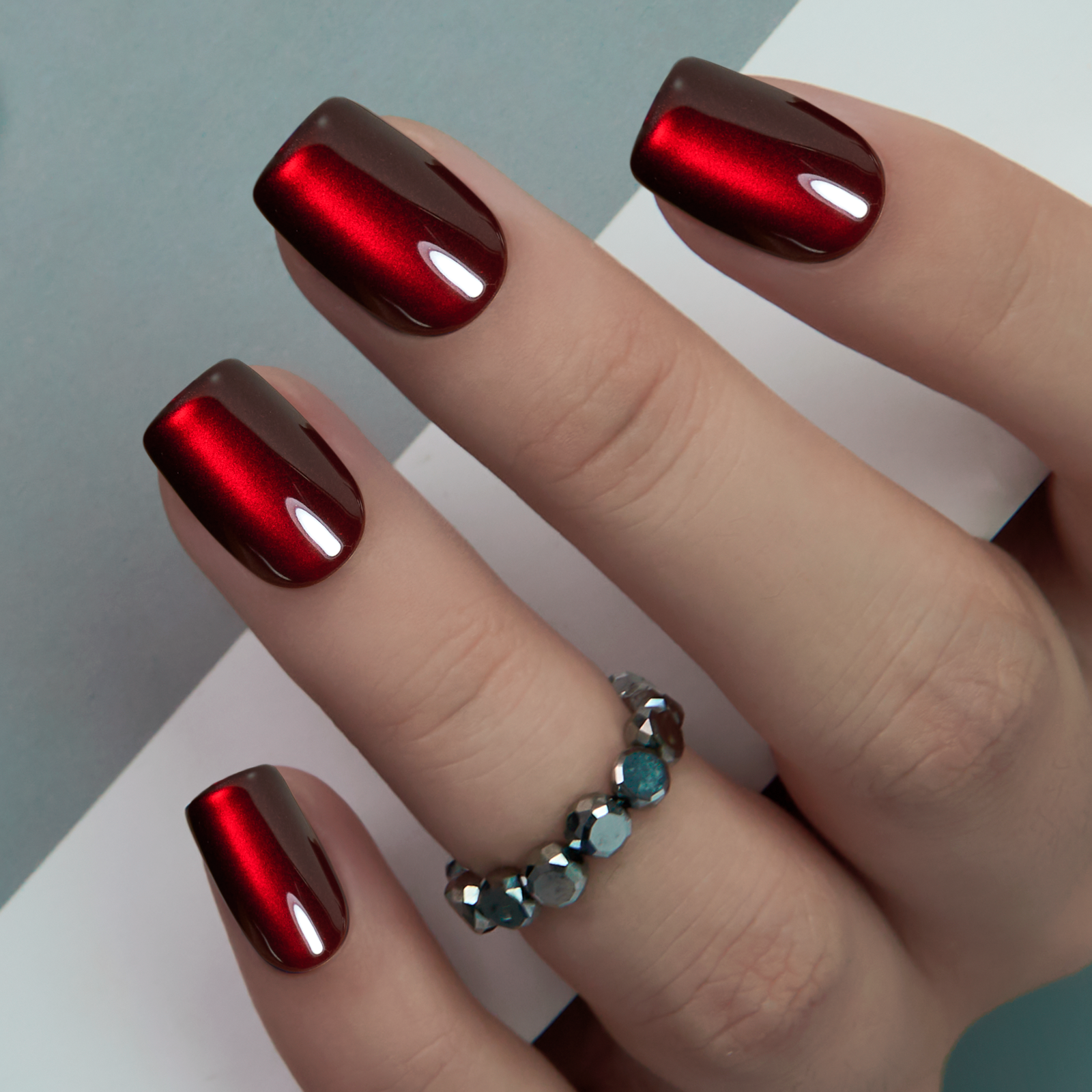 Mysterious Crimson short squoval press-on nails from the side