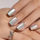 Mystic Chameleon short squoval press-on nails worn on a hand