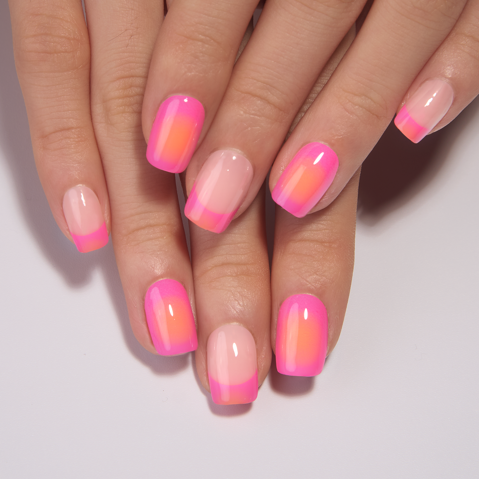 Neon Sunset short squoval press-on nails from the side