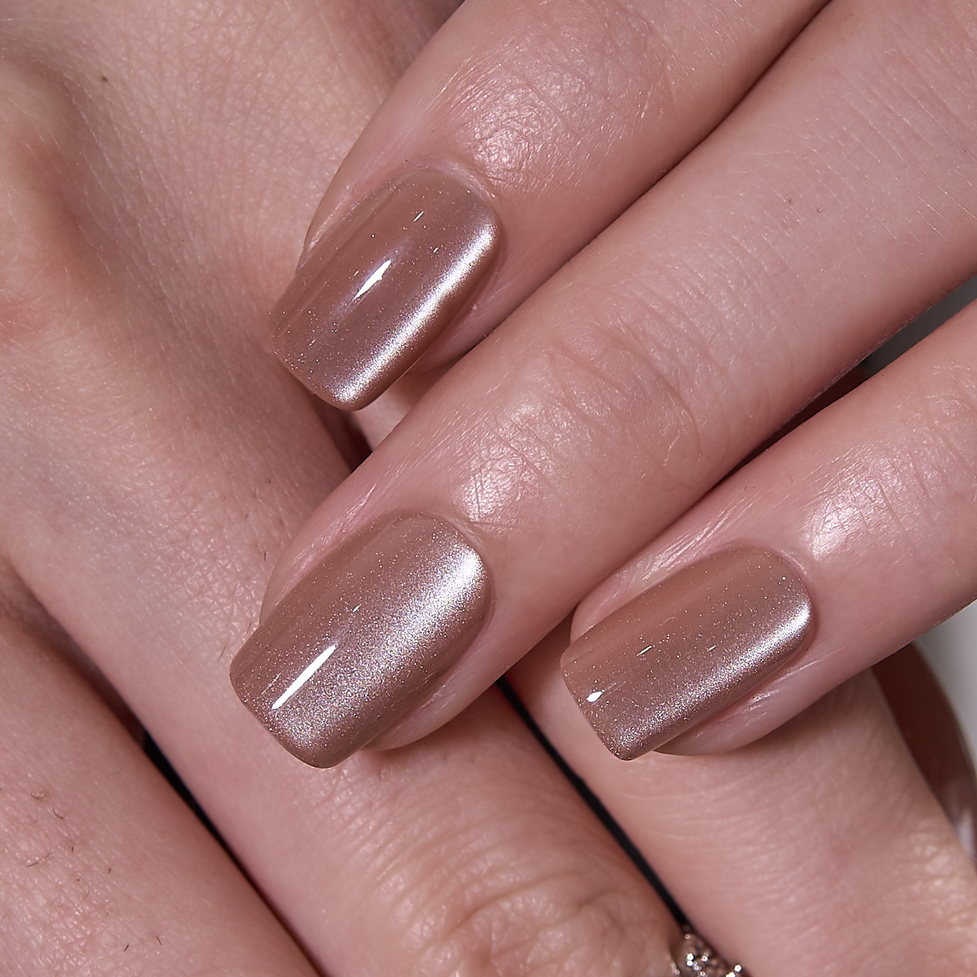 Nude Cat Grace medium squoval press-on nails from the side