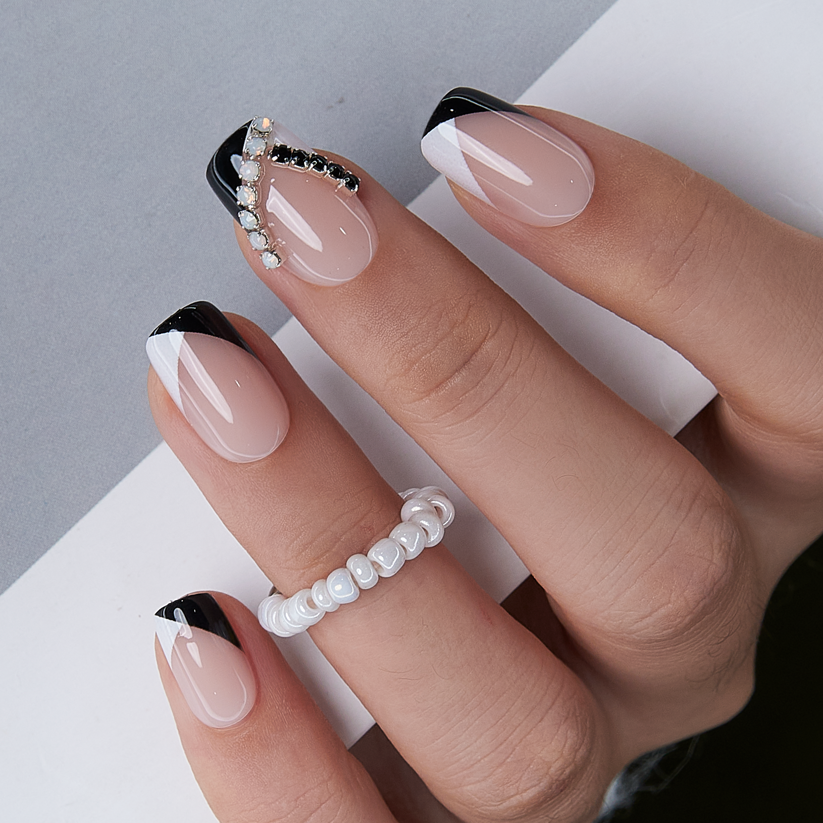 Nude French medium squoval nail detail